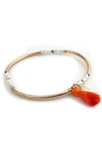 Goud-leren armband met kwastje en kraaltjes